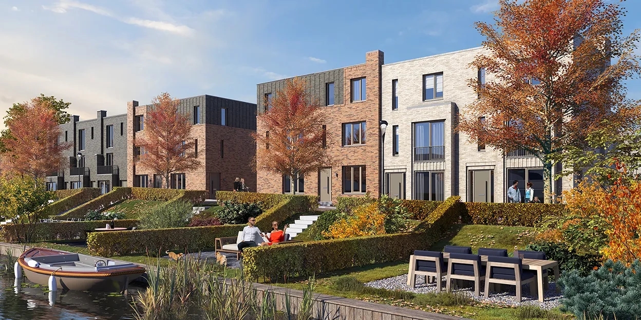 Impressie van de rijwoningen met overtuin aan de waterkant