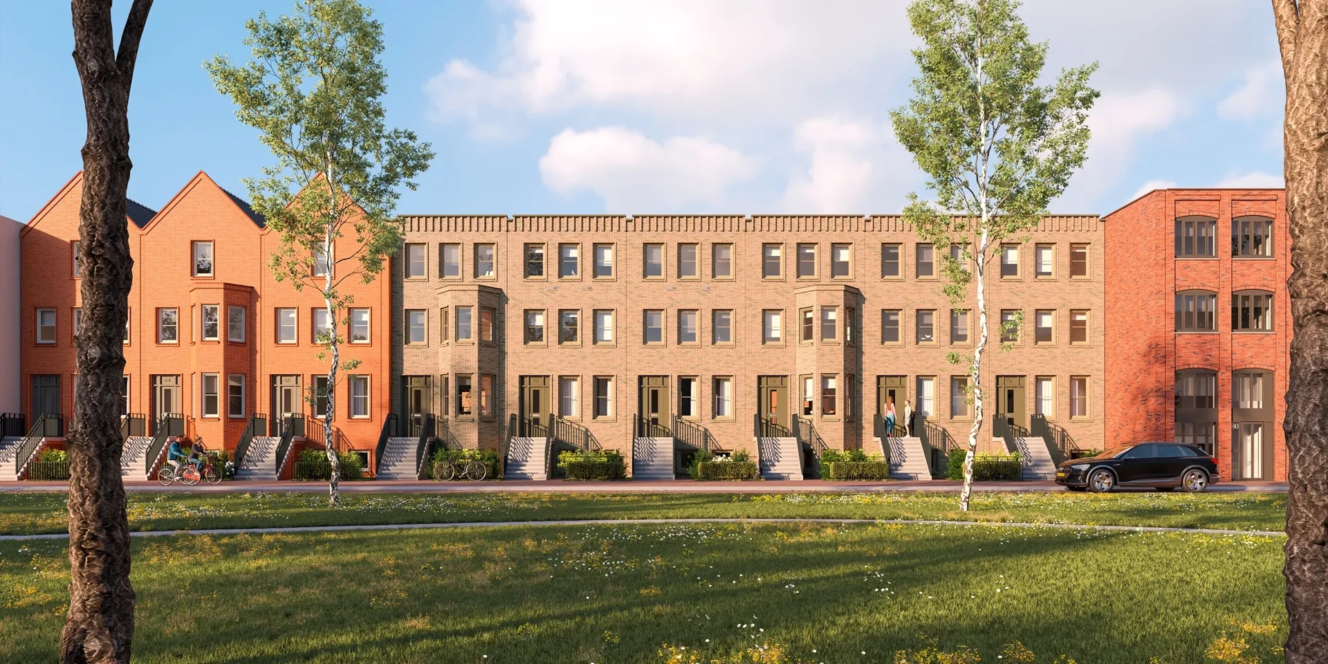 Rijwoningen met trap voor de deur en grasveld