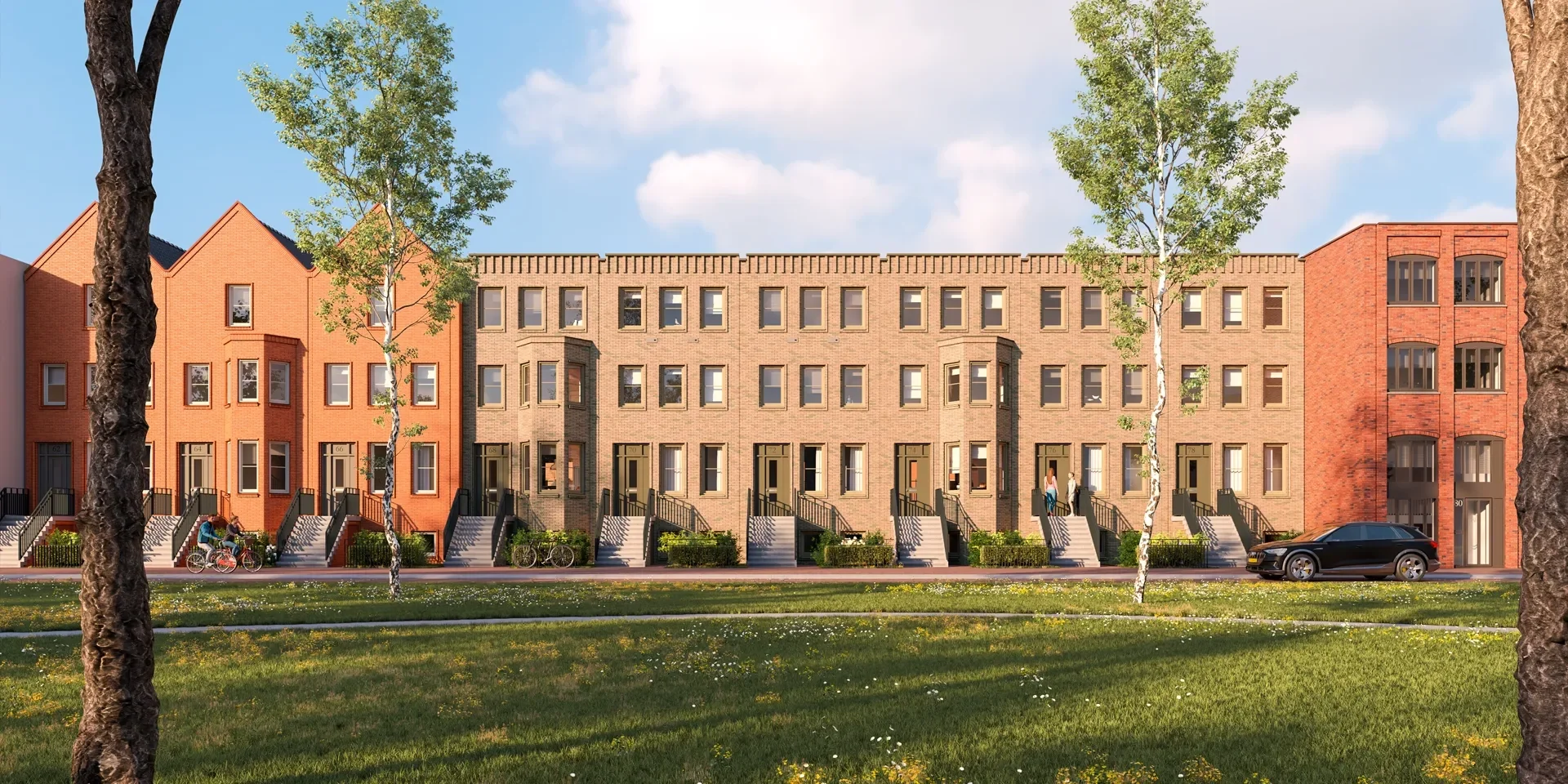 Rijwoningen met trap voor de deur en grasveld